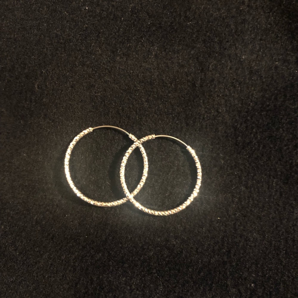 Silver hoop earrings.